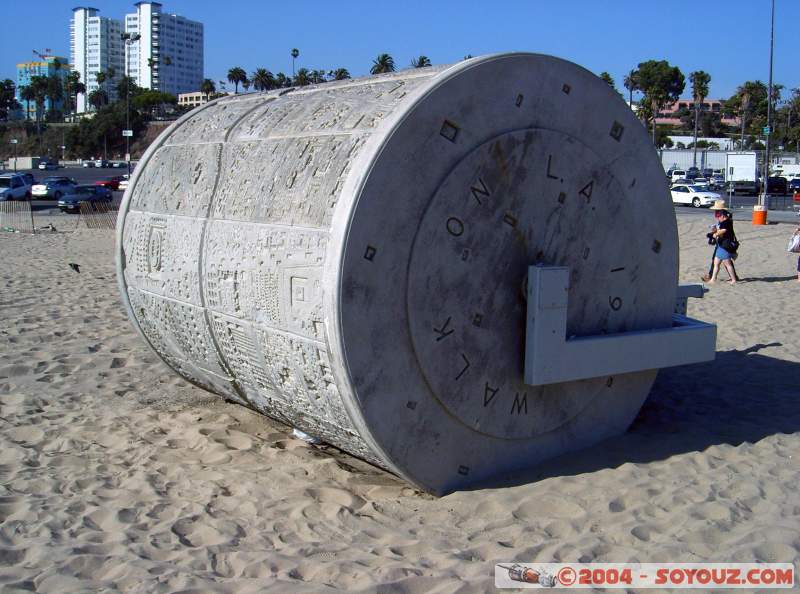 Oeuvre d'Art
Ce rouleau imprime sur le sable une texture en forme de ville vue du ciel
